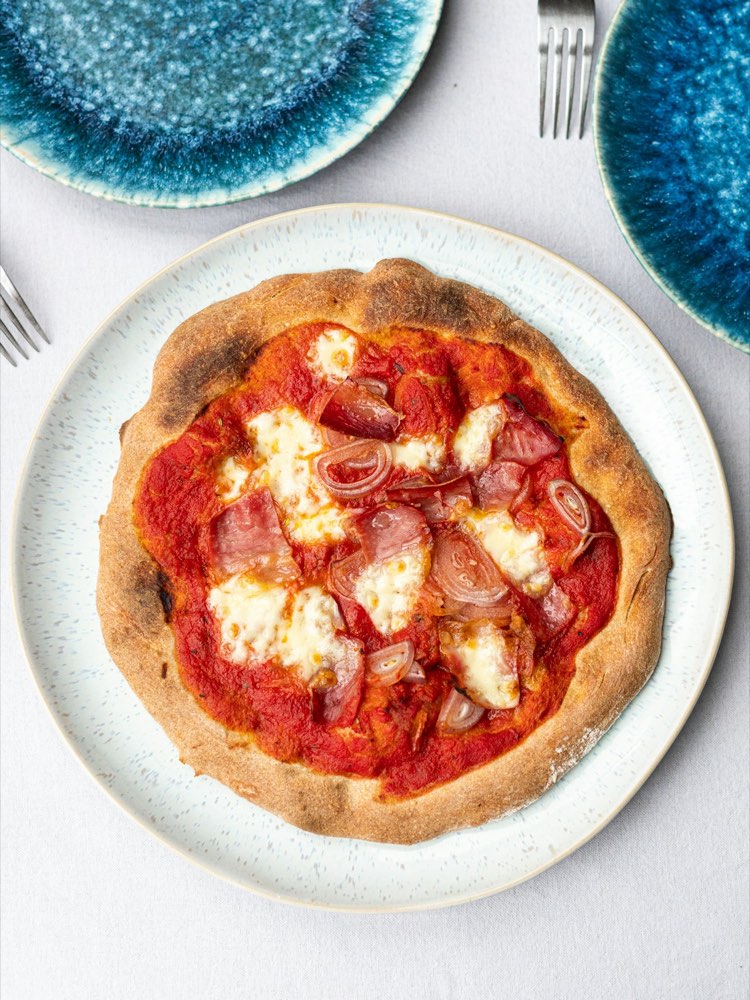 A fresh wood-fired pizza seen from above